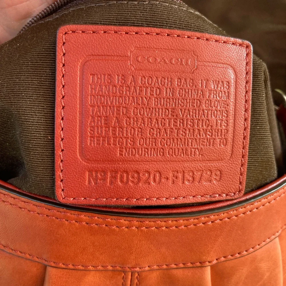 Coach SoHo, Burnt Orange Leather Shoulder Bag EUC, picture 8 shows a tiny dot - Picture 9 of 13